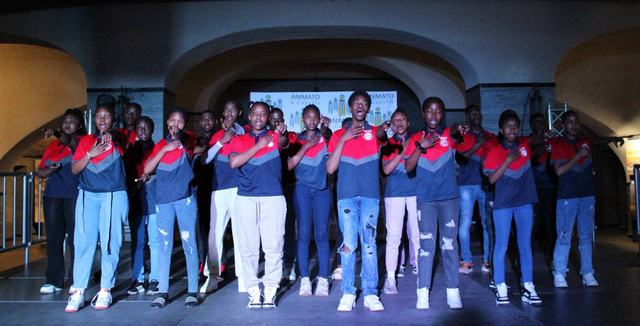The school choir performing on stage